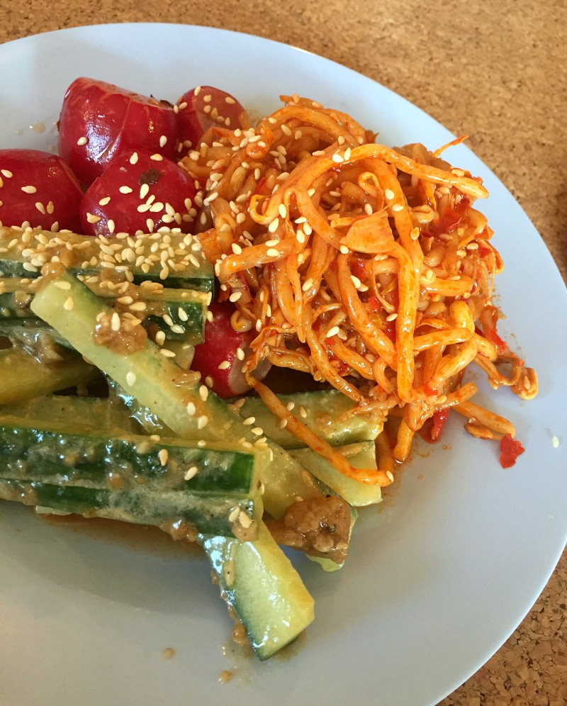 the spicy beansprouts, sichuan cucumbers and radishes in chilli oil to start at the Ling Ling's supper club, London.