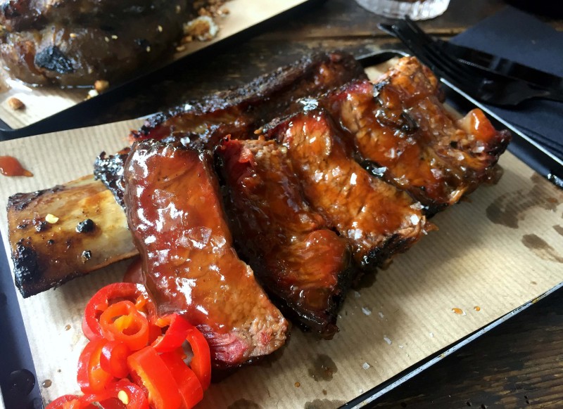 The 30-day dry aged beef rib, pickled red chilli at Smokestak, London.