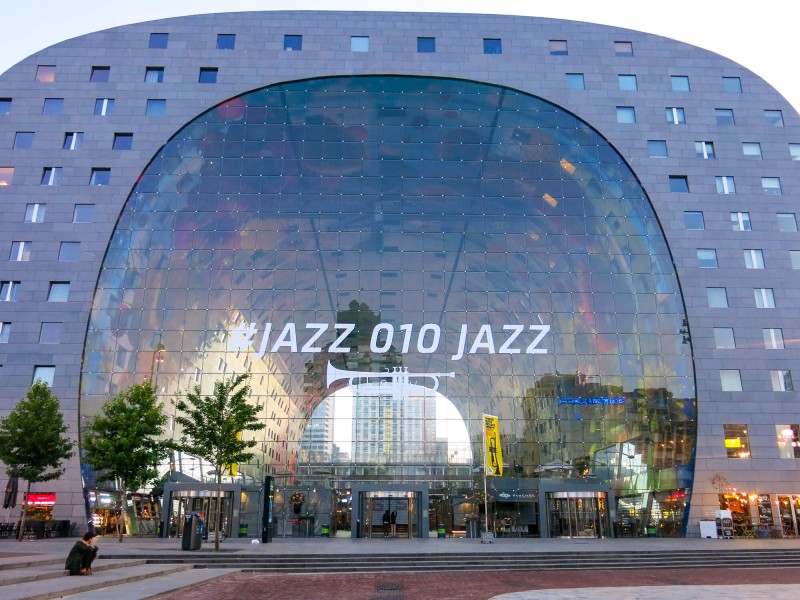The Markthal in Rotterdam is a massive market hall with food stalls, restaurants and a supermarket. It also has apartments that have windows down into the market. It's a wonderful building!